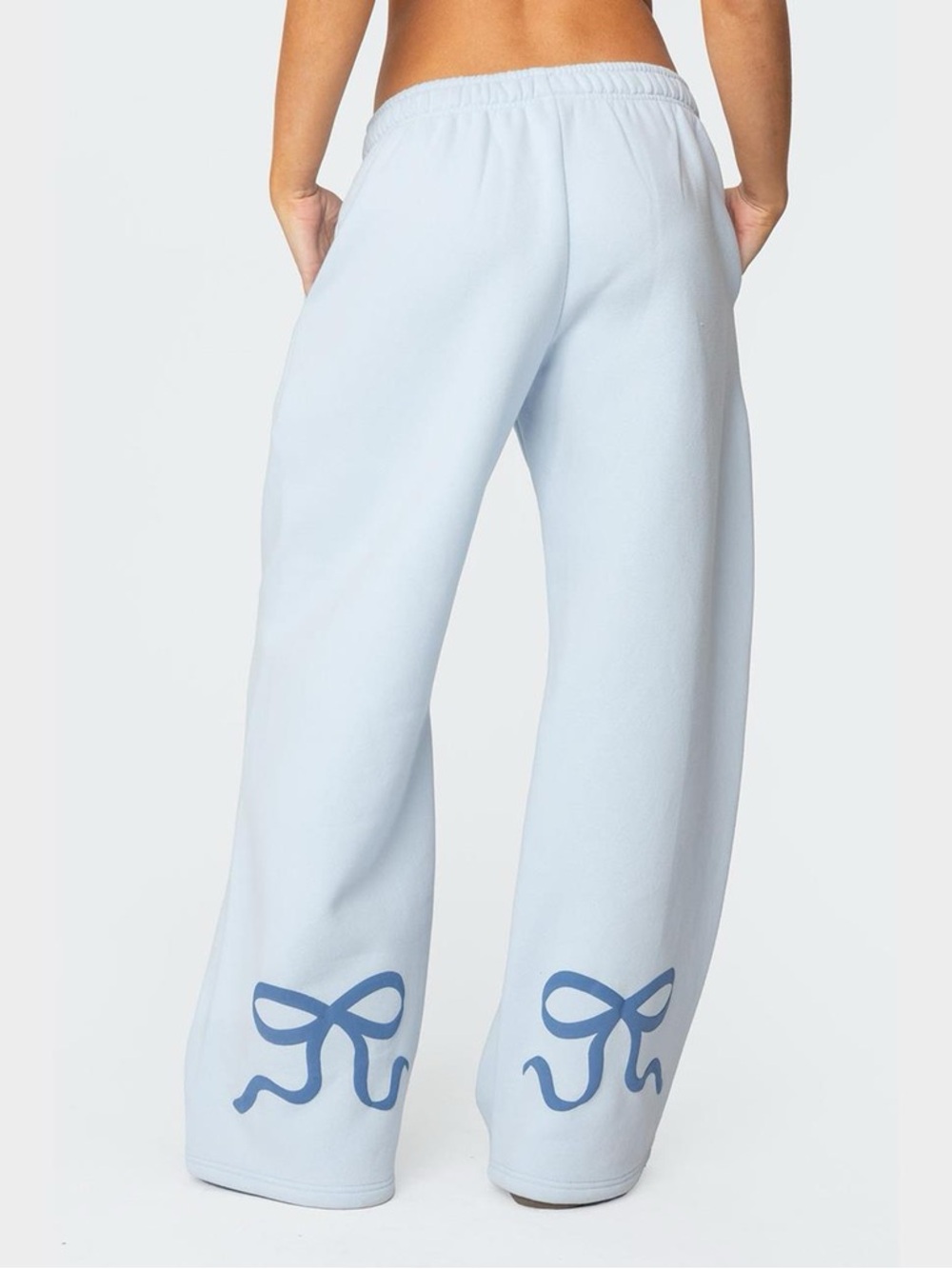 Edikted Bonney Bow Wide Leg Sweatpants in light blue.